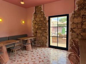 Historic stone walls inside Everything Brownie Café in downtown Oranjestad